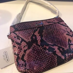 Coach purple snake skin wristlet